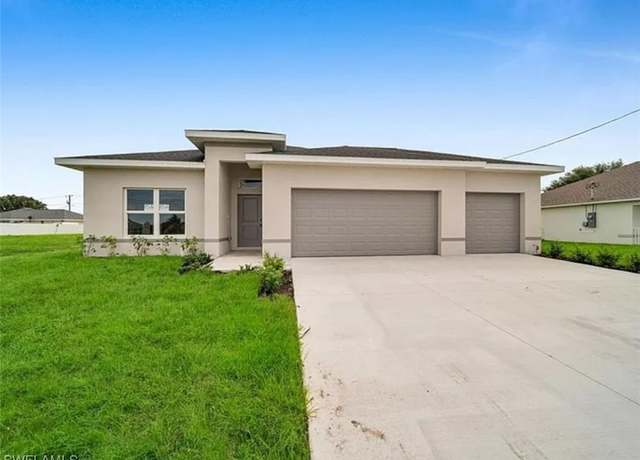 Property at 214 NW 11th Ter, Cape Coral, FL 33993, 4 beds, 2 baths