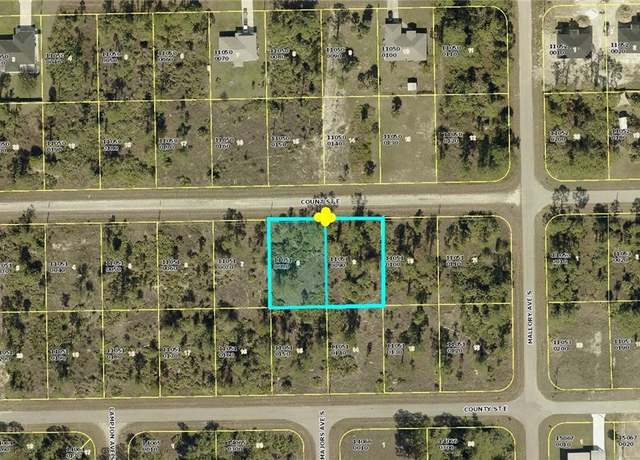 Property at 1222 Count St E, Lehigh Acres, FL 33974