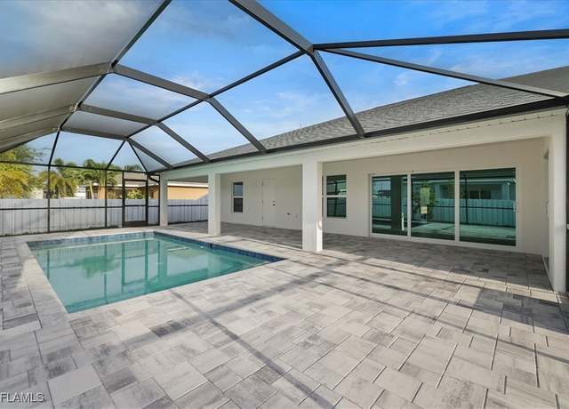 Property at 423 NE 20th St, Cape Coral, FL 33993, 4 beds, 3 baths