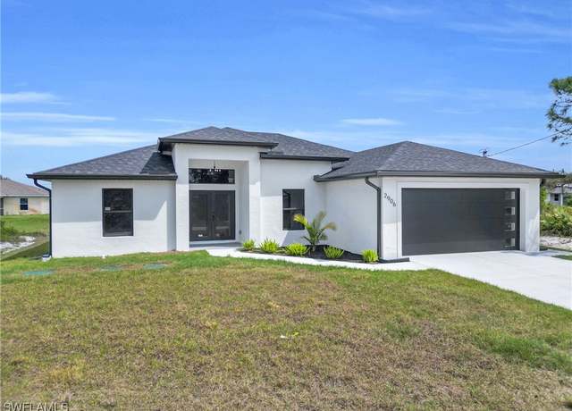 Property at 2906 28th St SW, Lehigh Acres, FL 33976, 4 beds, 2 baths