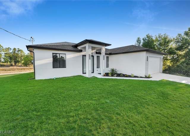 Property at 2106 W 18th St, Lehigh Acres, FL 33972, 3 beds, 2 baths
