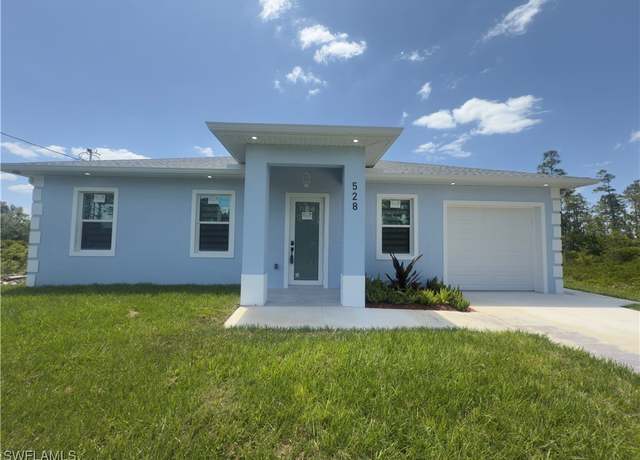Property at 528 Aspen Ave S, Lehigh Acres, FL 33974, 3 beds, 3 baths