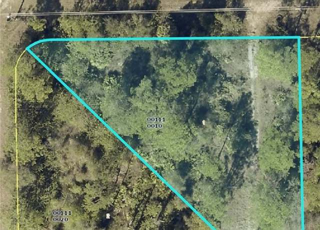 Property at 323 Woodburn Dr, Lehigh Acres, FL 33972