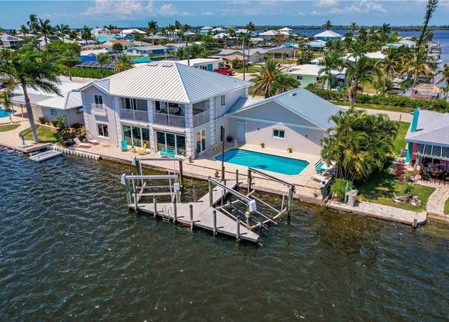 Property at 11593 Island Ave, Matlacha, FL 33993, 4 beds, 3 baths