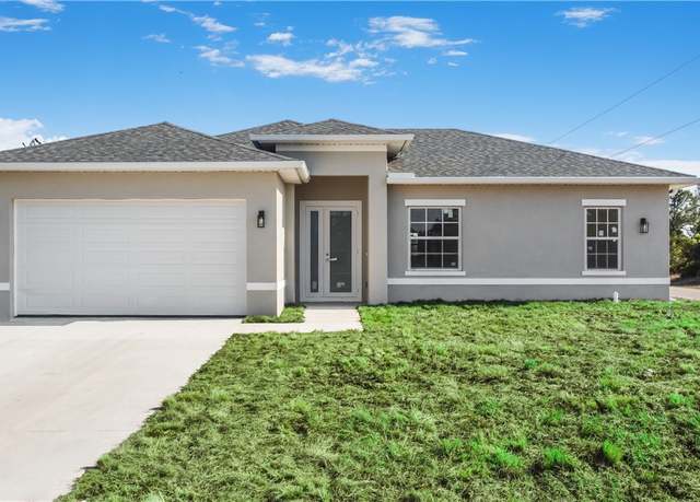 Property at 3111 11th St W, Lehigh Acres, FL 33971, 3 beds, 2.5 baths