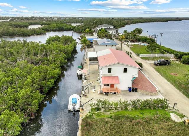 Property at 8151 Moyer Ln, Bokeelia, FL 33922, 2 beds, 2 baths