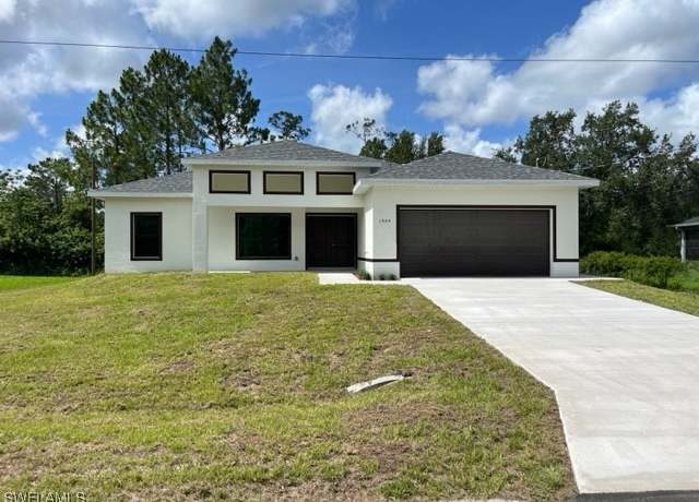 Property at 1904 E 11th St, Lehigh Acres, FL 33936, 4 beds, 2 baths