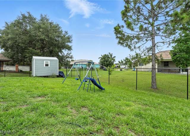 Property at 5005 Beauty St, Lehigh Acres, FL 33971, 3 beds, 2 baths