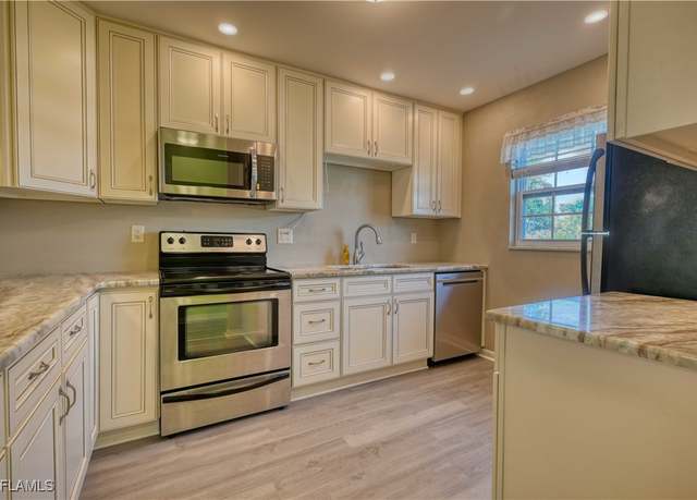 Property at 1398 Myerlee Country Club Blvd, Fort Myers, FL 33919, 2 beds, 2 baths
