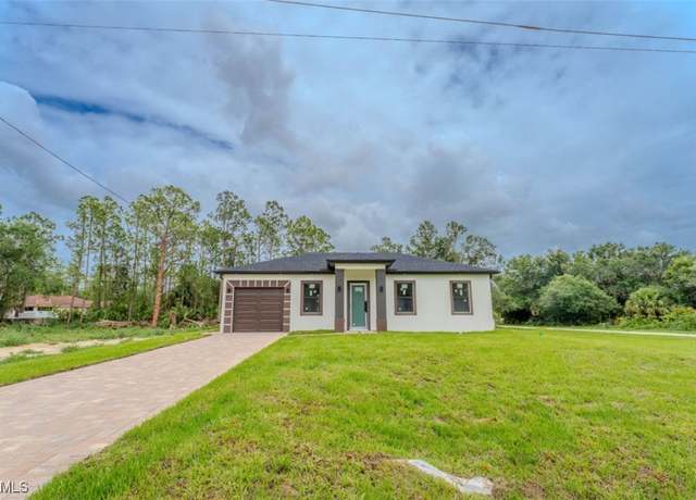 Property at 137 National Ave S, Lehigh Acres, FL 33974, 3 beds, 3 baths