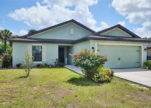 Property at 125 Shadow Lakes Dr, Lehigh Acres, FL 33974, 3 beds, 2 baths