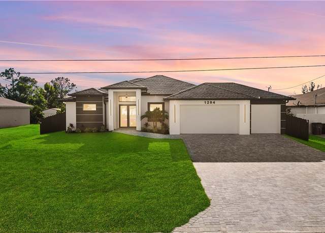 Property at 1204 NW 21st Pl, Cape Coral, FL 33993, 4 beds, 3 baths