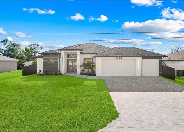 Property at 1204 NW 21st Pl, Cape Coral, FL 33993, 4 beds, 3 baths