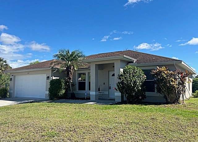 Property at 457 Majors Ave S, Lehigh Acres, FL 33974, 3 beds, 2 baths