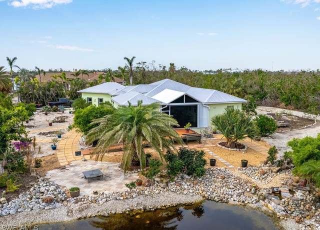 Property at 4931 Island Acres Ct, St. James City, FL 33956, 3 beds, 3 baths