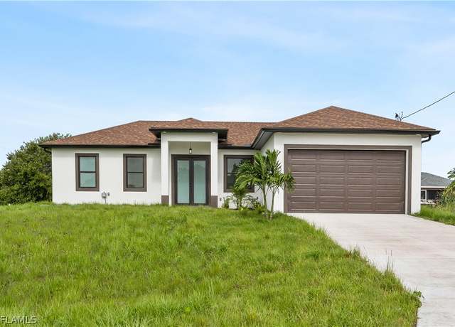 Property at 744 Oakridge Ave S, Lehigh Acres, FL 33974, 3 beds, 2 baths