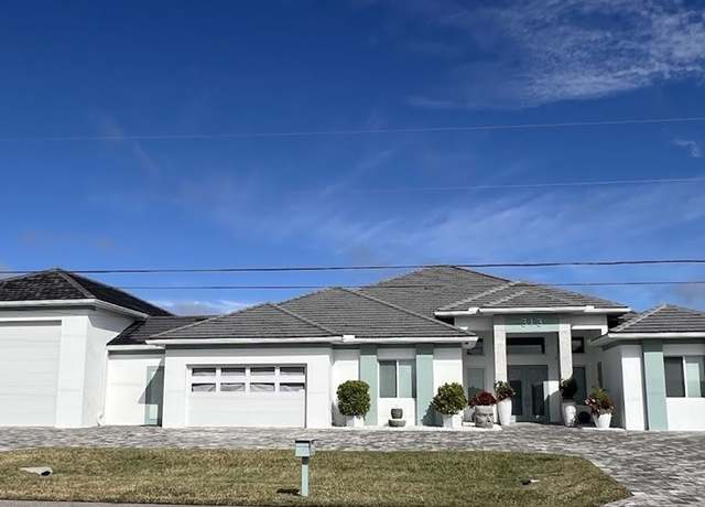 Property at 313 SW 21st St, Cape Coral, FL 33991, 4 beds, 5.5 baths