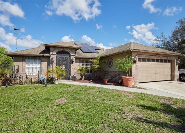 Property at 2606 53rd St SW, Lehigh Acres, FL 33976, 4 beds, 2 baths