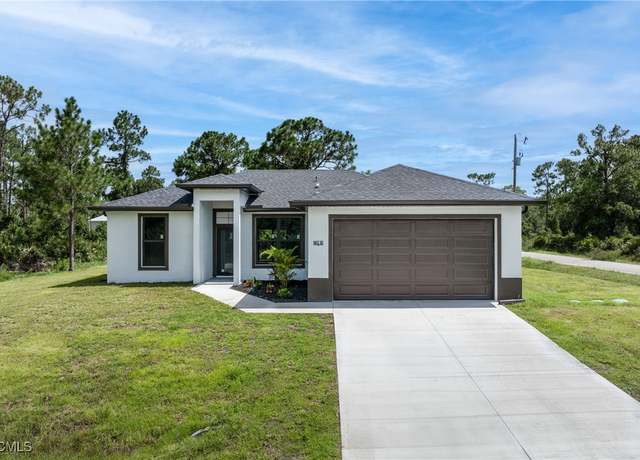 Property at 907 W 9th St, Lehigh Acres, FL 33972, 3 beds, 2 baths