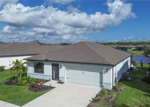 Property at 10811 Firebush Cir, North Fort Myers, FL 33917, 4 beds, 2 baths