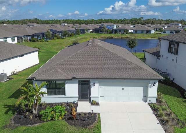 Property at 10811 Firebush Cir, North Fort Myers, FL 33917, 4 beds, 2 baths