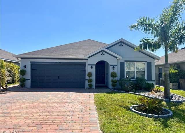 Property at 10293 Silver Pond Ln, Lehigh Acres, FL 33936, 3 beds, 2 baths