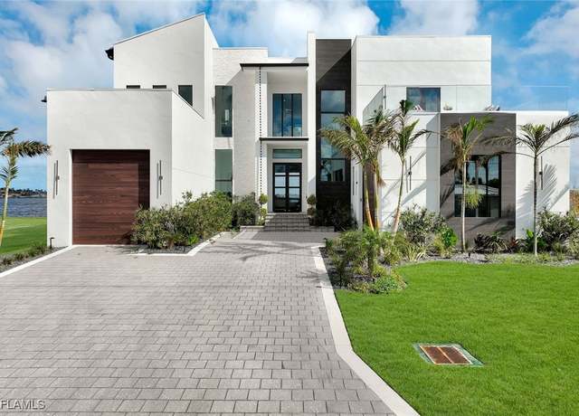Property at 5831 SW 1st Ave, Cape Coral, FL 33914, 5 beds, 6.5 baths
