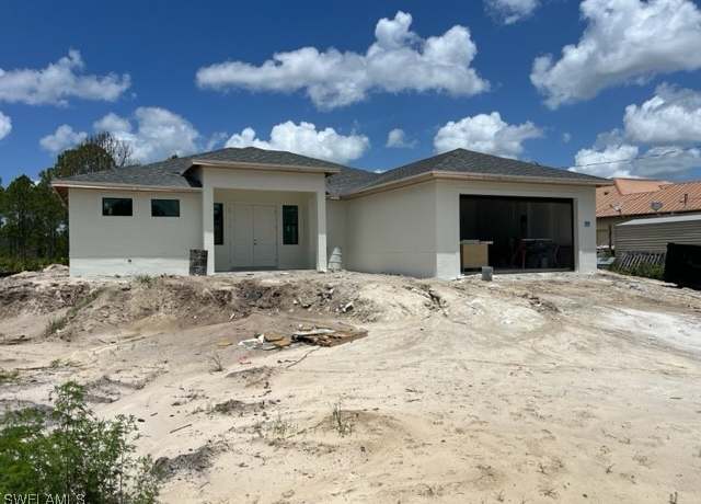 Property at 1005 State Ave, Lehigh Acres, FL 33972, 4 beds, 3 baths