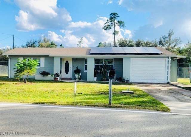 Property at 1702 E 10th St, Lehigh Acres, FL 33972, 3 beds, 2 baths
