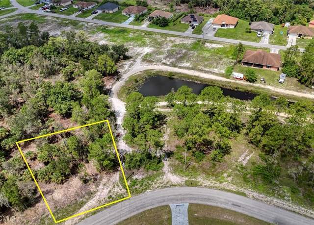 Property at 443 Burrstone Dr, Lehigh Acres, FL 33974