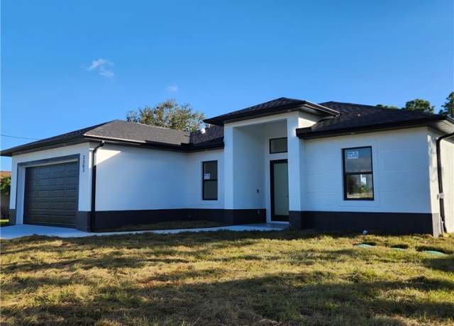 Property at 3303 8th St W, Lehigh Acres, FL 33971, 3 beds, 2 baths