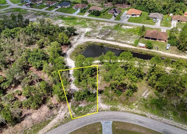 Property at 445 Burrstone Dr, Lehigh Acres, FL 33974