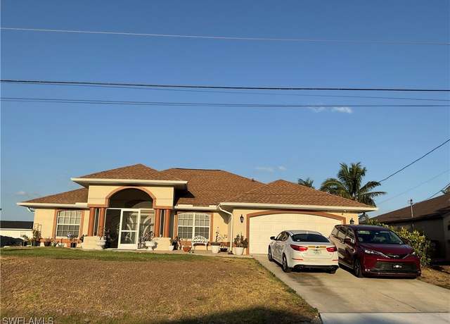 Property at 1009 NE 5th Ave, Cape Coral, FL 33909, 4 beds, 2 baths