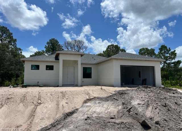 Property at 3604 Flora Ave N, Lehigh Acres, FL 33971, 4 beds, 4.5 baths