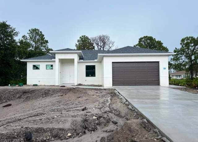 Property at 3604 Flora Ave N, Lehigh Acres, FL 33971, 4 beds, 4.5 baths