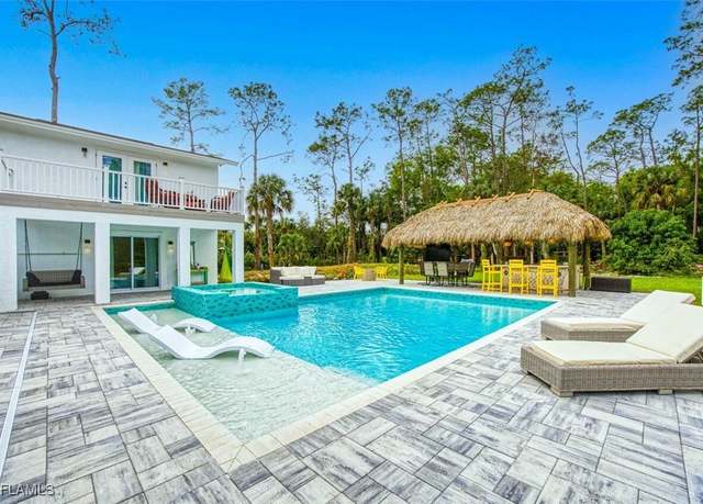 Property at 675 Logan Blvd S, Naples, FL 34119, 4 beds, 3 baths
