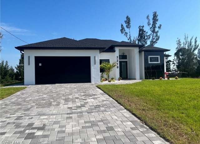 Property at 2210 NW 21st St, Cape Coral, FL 33993, 4 beds, 2.5 baths
