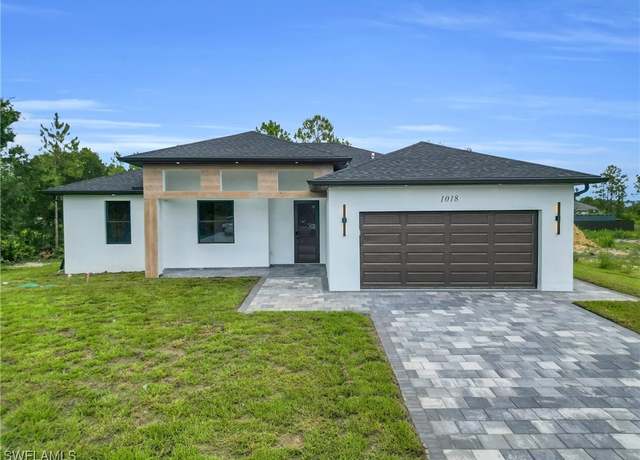 Property at 1018 Calvin Ave, Lehigh Acres, FL 33972, 4 beds, 3 baths