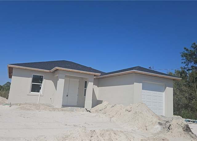Property at 2618 25th St W, Lehigh Acres, FL 33971, 3 beds, 2 baths