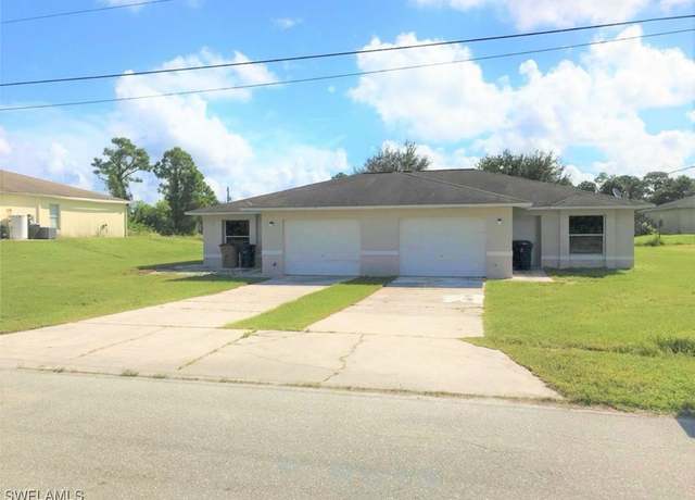Property at 217/219 Ivan Ave S, Lehigh Acres, FL 33973, 6 beds, 4 baths