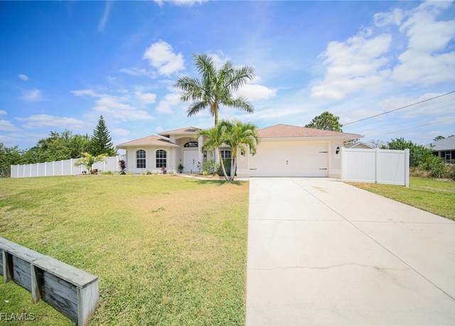 Property at 823 Portland St E, Lehigh Acres, FL 33974, 3 beds, 2.5 baths