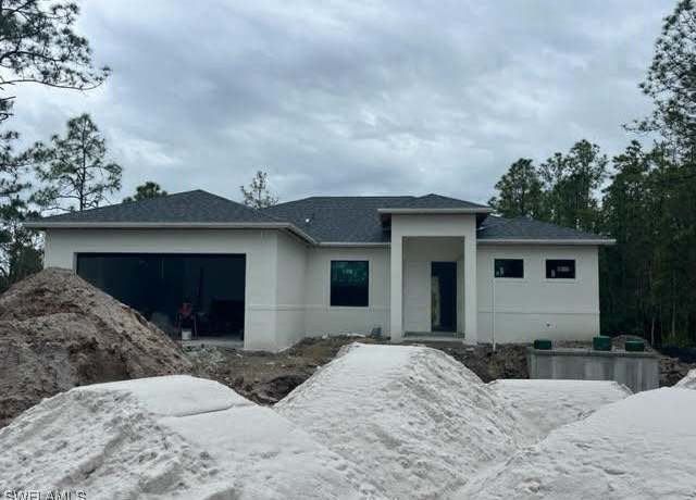 Property at 3107 33rd St W, Lehigh Acres, FL 33971, 4 beds, 2.5 baths