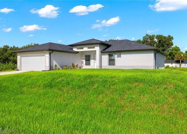 Property at 1611 Louis Ave, Lehigh Acres, FL 33972, 4 beds, 2 baths