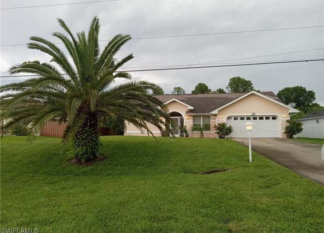 Property at 833 Sentinela Blvd, Lehigh Acres, FL 33974, 3 beds, 2 baths