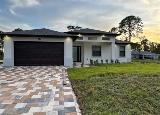 Property at 932 Milwaukee Blvd, Lehigh Acres, FL 33974, 4 beds, 2 baths