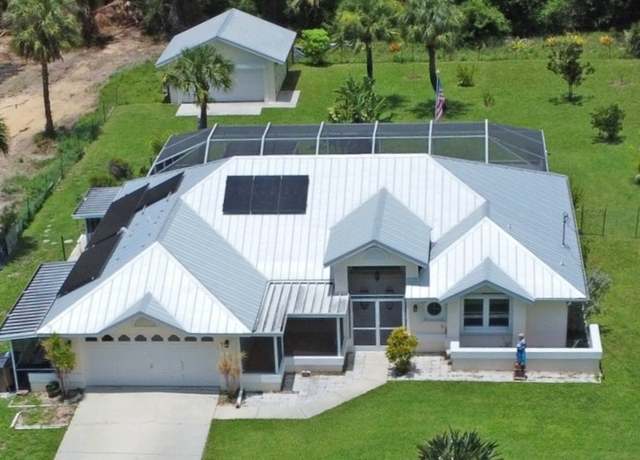 Property at 409 Columbus Ave, Lehigh Acres, FL 33972, 3 beds, 2 baths