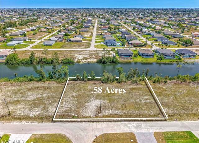 Property at 2002 NW 27th St, Cape Coral, FL 33993