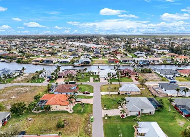 Property at 142 SW 34th Pl, Cape Coral, FL 33991, 4 beds, 2 baths