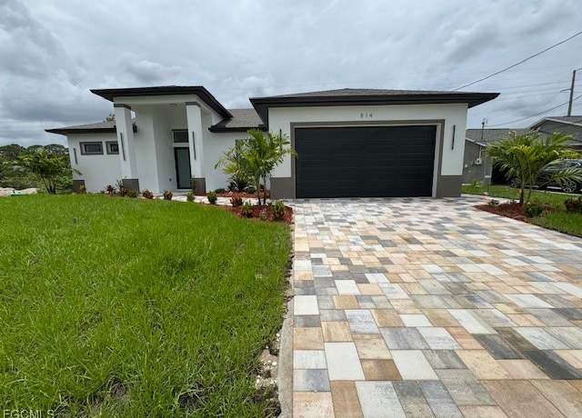 Property at 814 Floyd Ave S, Lehigh Acres, FL 33976, 4 beds, 3 baths