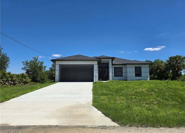 Property at 1011 Harwood Ave S, Lehigh Acres, FL 33974, 3 beds, 2.5 baths